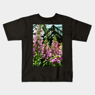 Pink Foxglove Framing a Glass Greenhouse Kids T-Shirt